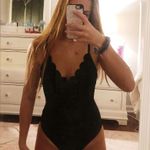 Vanilla/beach Black One-piece Photo 0