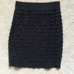 Black ruffle mini skirt Size 4 Photo 1