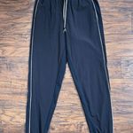 Athleta • Colorblocked Brooklyn Jogger drawstring track pant black white stripe Photo 0