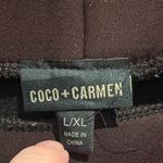 Coco + Carmen  Elegant Black Garment Photo 1