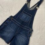 Paige denim short overalls.These overalls are dark wash. Photo 0
