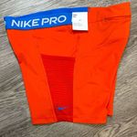 Nike Women’s Pro biker shorts- red / blue - Large Photo 0