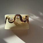 Wavy gold cuff bracelet Photo 6