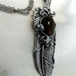 Silver tone feather tigers eye pendant necklace Photo 5