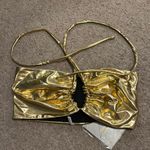 Amazon  gold top Photo 0