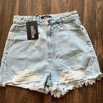 Missguided Cross Patched Ripped Denim Short Photo 0