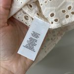 Industry Embroidered Eyelet Puff Sleeve Button Photo 4