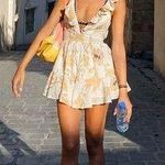 Selfie Leslie Janiya Empire Waist Open Back Romper Floral Print Yellow |  Photo 0