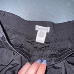 Urban Outfitters Black track joggers.   Photo 1