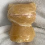 Hello Kitty Cute  Yellow Calcite Crystal with Red and White Banding Photo 1