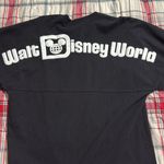 Disney  spirit jersey sz small black long sleeve white raised lettering pullover Photo 7