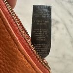 Fossil  Cowhide Leather Wristlet peachy color Photo 7