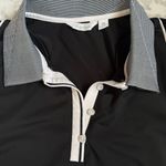 Lady Hagen  Sleeveless Black Polo Shirt with White Trim Photo 2