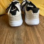 Nike  Cream and Purple Running Shoes Photo 3