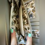 Women’s wristlet with gold accents and wrist strap Tan Photo 4