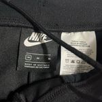 Nike Black Athletic Pants with White Logo Photo 1
