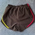 Nike Dri-Fit Women’s Black Rainbow Striped Athletic Running Shorts Photo 4