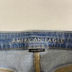 American Eagle  women's light wash curvy hi-rise shortie distressed ripped shorts Photo 5