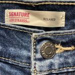 Levi's Levi’s woman’s size 30W 32” inseam relaxed fit boot cut jeans Photo 2
