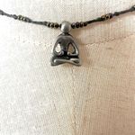 Silver tone yoga choker pendant necklace on cord Photo 1
