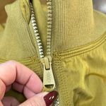 Free People FP Movement Ashani Jumpsuit Olive Yellow Gold Oversized One Piece Size Small Photo 11