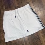 Varley  Patrick skort  white and navy striped logo medium athletic tennis spring Photo 2