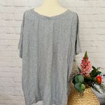 Woman Within Grey Tee Photo 6