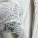 Poof Apparel Elegant Cream V-Neck Sweater Photo 3