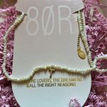 8 Other Reasons  PEARL NECKLACE WITH A T Photo 1