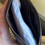 Coach Authentic signature shimmery Leather wristlet and 2 charms set in box š Photo 4