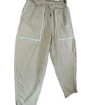 Nike Women’s Essential Woven Loose High Rise Curve Pants Shearling Pockets Med Photo 4