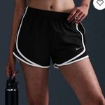 Nike | Tempo Dri-FIT Women's Athletic Performance Mid-Rise Running Shorts Photo 0