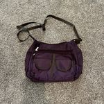 Chic Purple Crossbody Bag with Versatile Design Photo 0