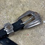 Tony Lama  Black Leather Belt with Silver Buckle with heart design
Size: 28 Photo 1