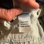 AGOLDE Toni Mid Rise Slim Straight Leg Jeans in Stratosphere Photo 9