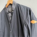 Merrell NWT Trailhead Insulated Reversible Bomber Jacket Size Small Black Grey Photo 2