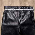 Free People faux leather pants preowned, please review photos on size. Photo 4
