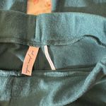 Urban Outfitters Out From Under Easy Does It Cozy Knit Flare Pant in dark green Photo 1