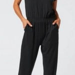 Vuori Short Sleeve Lux Crew Jumpsuit in Black Size Small Photo 0