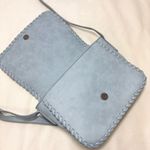 Hayden Harnett crossbody bag in a light blue shade with whipstitch detailing Photo 6