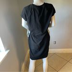 Calvin Klein  dress size Large 
In great condition 
Stretchy 
Logo on both sides Photo 5