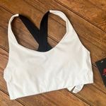 New Balance Women’s  white sports bra cross back size medium New NWT Photo 0