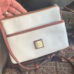 Dooney & Bourke Authentic  White Pebbled Leather Logo zip top crossbody Photo 1
