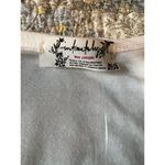 Free People  Women's Cream and White Bodysuit. V neck Photo 1