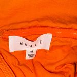 mable orange strapless romper medium Photo 3