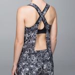 Lululemon  The Runsie Flowabunga Black Angel Wing Romper Photo 0