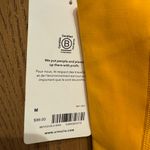 Athleta  Ultimate Stash 11 Capri , Women's Size Medium, Yellow NWT Photo 5