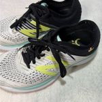 New Balance White and Black Athletic Shoes with Lime Accents Photo 0