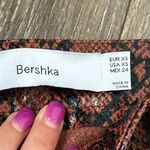 Bershka High-waisted snake skin trousers Photo 1