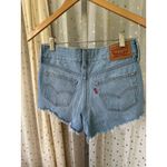 Levi's Women's Superlow 5 Pocket Light Wash Distressed Raw Hem Denim Shorts 26 Photo 4